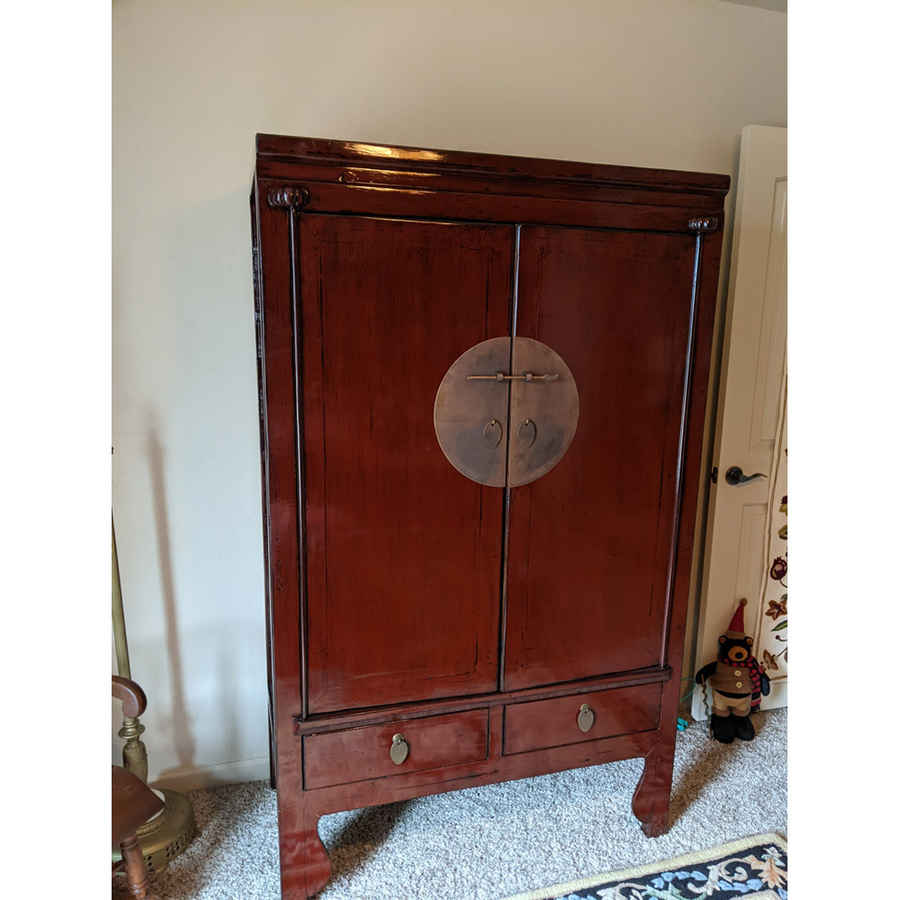 Customer's Asian furnishing red elmwood armoire