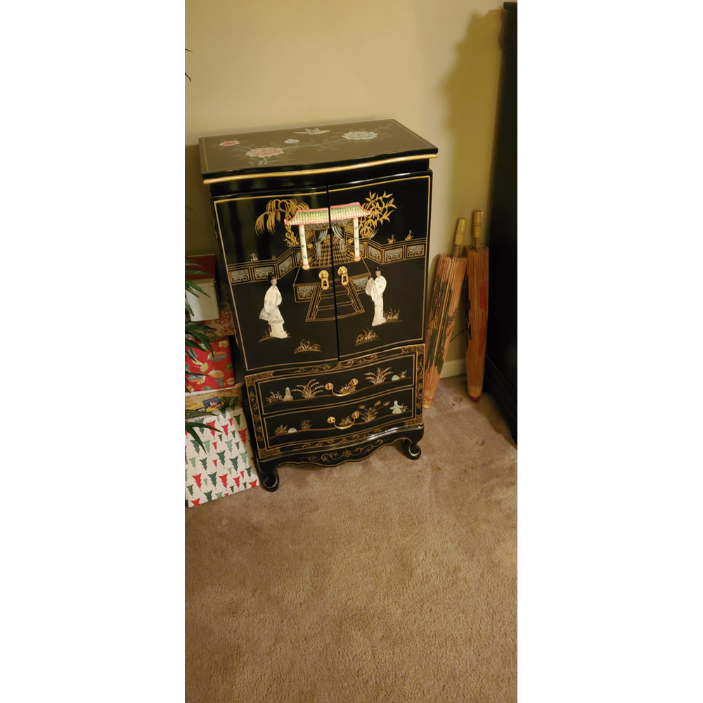 Customer's Asian furnishing black lacquer mother of pearl cabinet