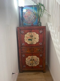 Customer's Asian orange elmwood cabinet