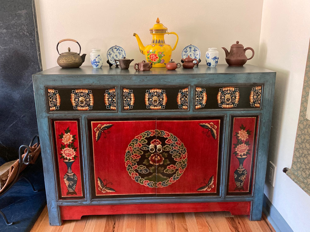 Customer's Asian furnishing elmwood tibetan cabinet with tea pots