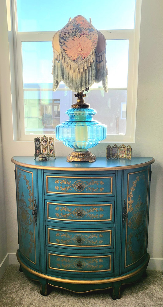 Customer's Asian furnishing blue french style half moon cabinet